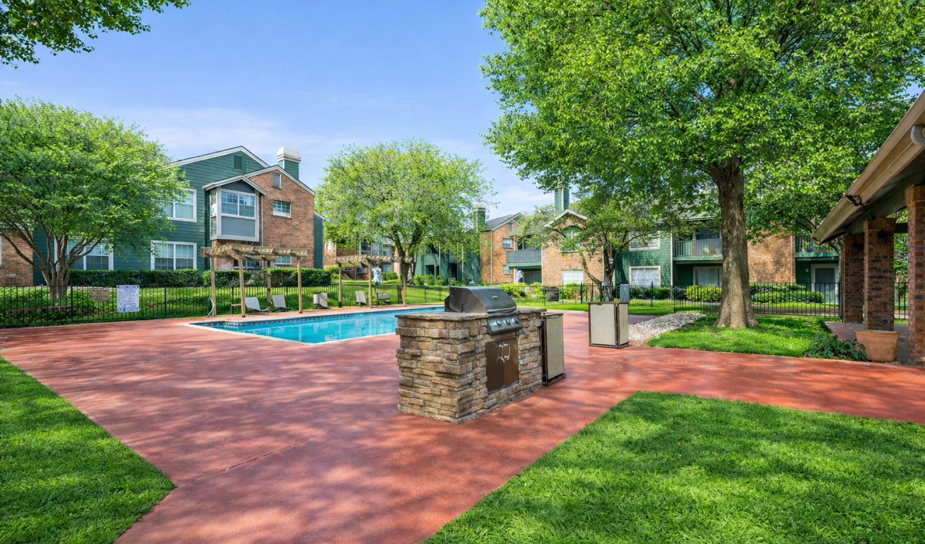 Resort-style swimming pool with lounge seating