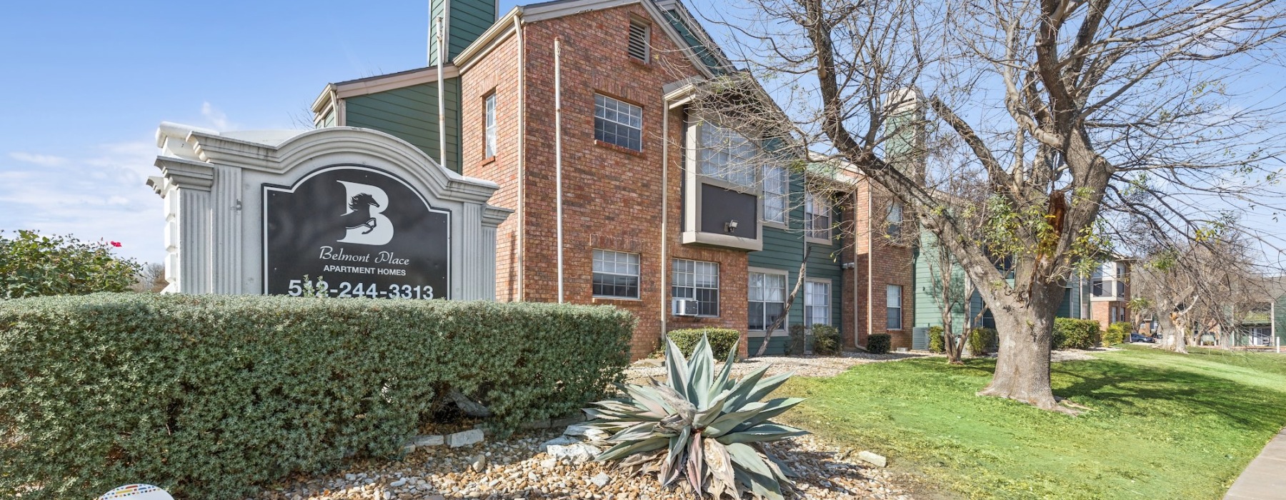 a sign near a large building