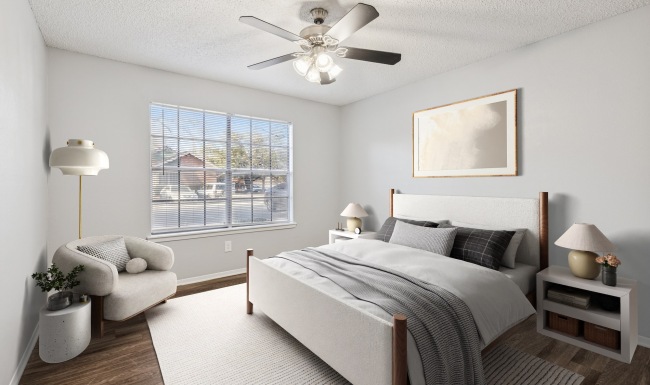Bedroom with natural lighting and high ceilings
